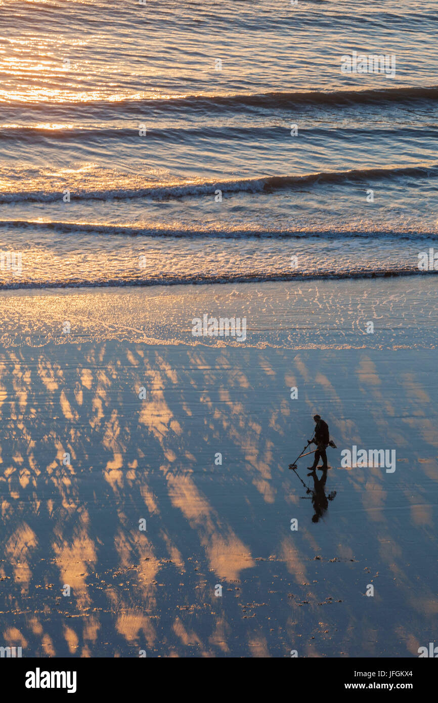 England, Yorkshire, Scarborough, Man Metal Detecting on Scarborough
