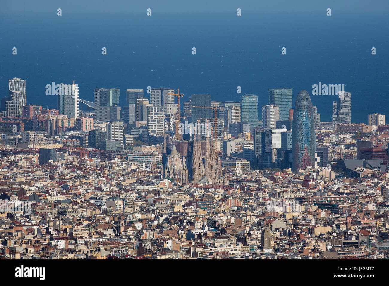Spain, Catalunya, Barcelona City, Sagrada Familia and Diagonal Mar Skyline Stock Photo