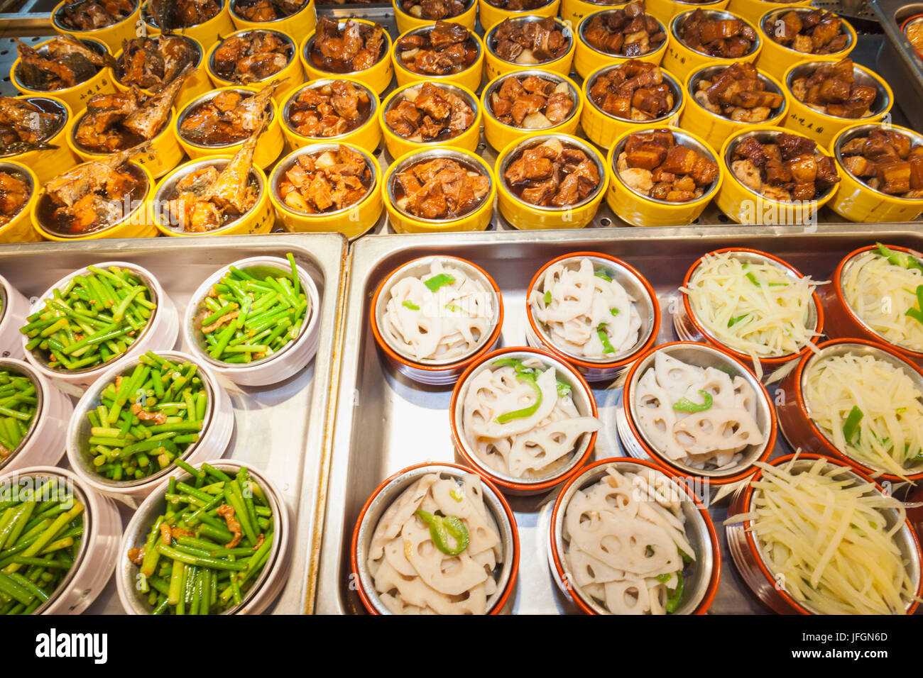 Stainless hotel pans on food warmers with various meals. Roasted meat  pieces with vegetable. Self-service buffet table. Celebration, party,  wedding Stock Photo - Alamy