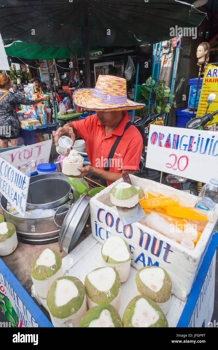 Thailand, Bangkok, Khaosan Road, Coconut Ice Cream Vendor Stock Photo