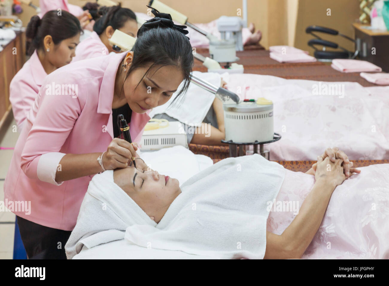 Thailand, Bangkok, Khaosan Road, Woman Receiving Typical Beauty Treatment Stock Photo