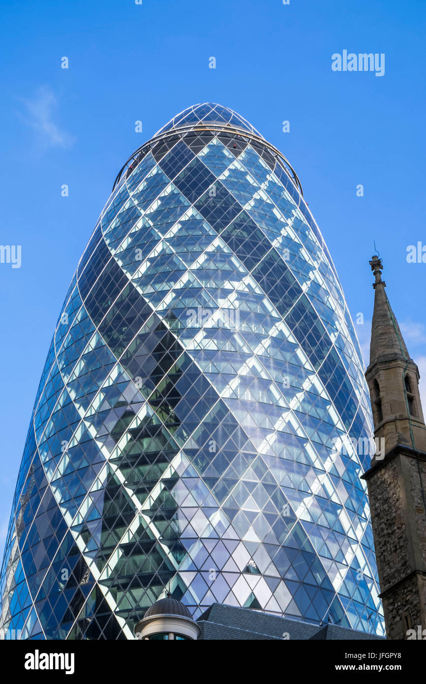 England, London, The City, 30 St Mary Axe Building and St Andrew Undershaft Church Stock Photo