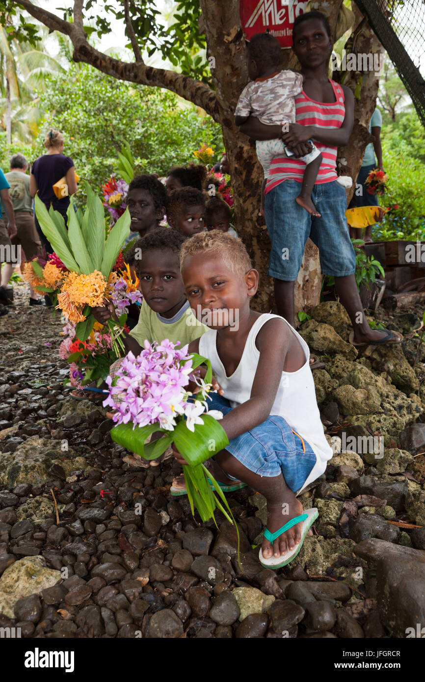Locals of the island Telina greet visitor, Marovo lagoon, the Solomon Islands Stock Photo