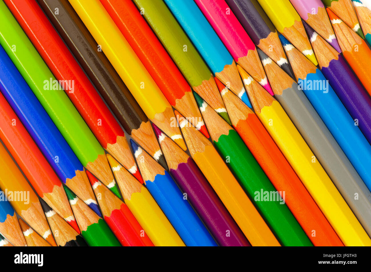 Coloured pencils form a team Stock Photo