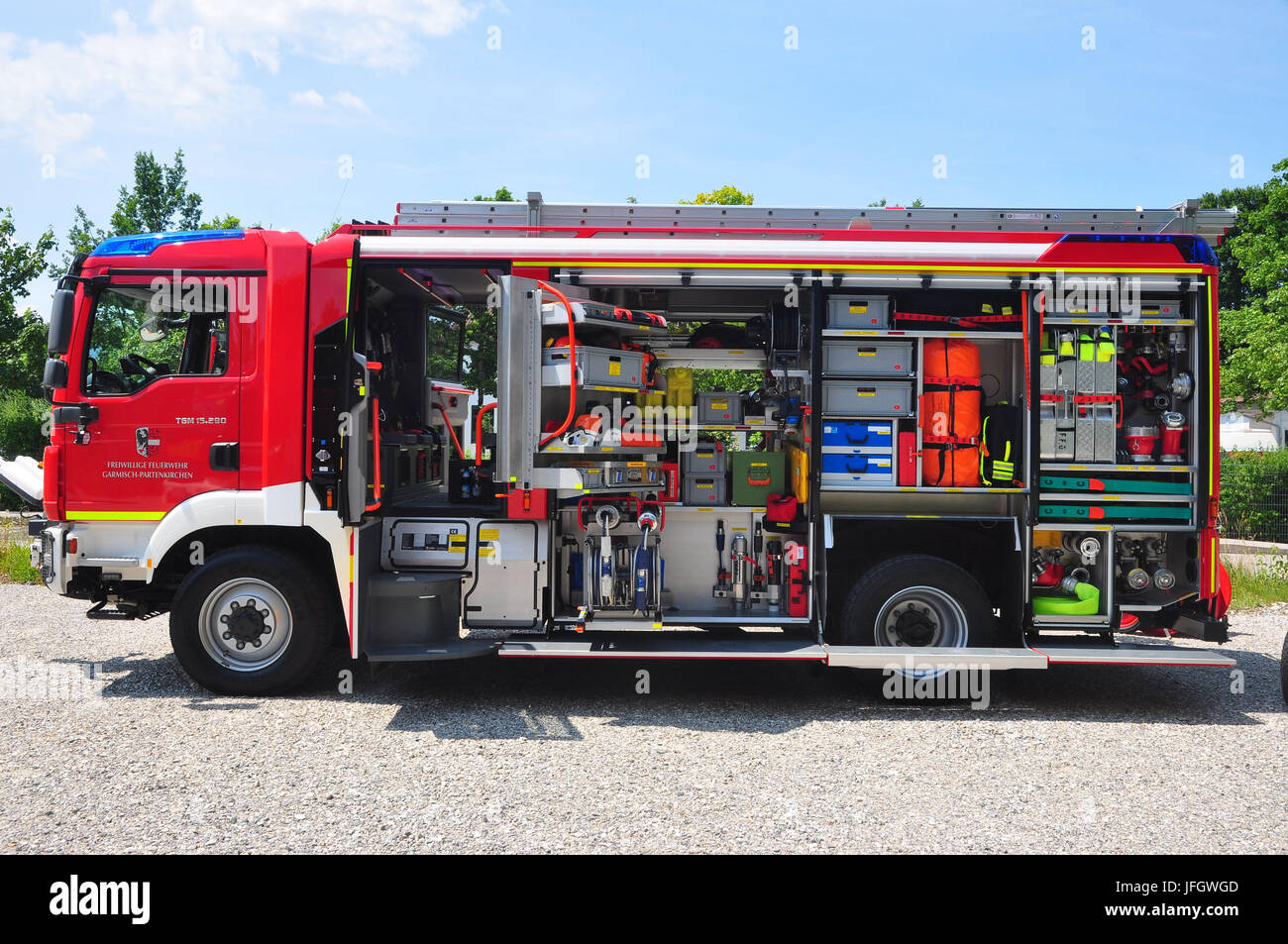 Fire brigade, fire fighting vehicle Stock Photo Alamy