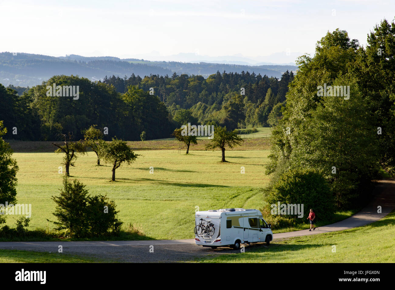 Camper, a meadow with scattered fruit trees, Ravensburg, Baden-Wurttemberg, Germany Stock Photo