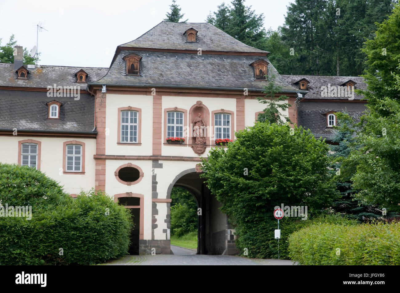 baroque gate house, Cistercian cloister of Arnsburg, light, Hessen, Germany Stock Photo