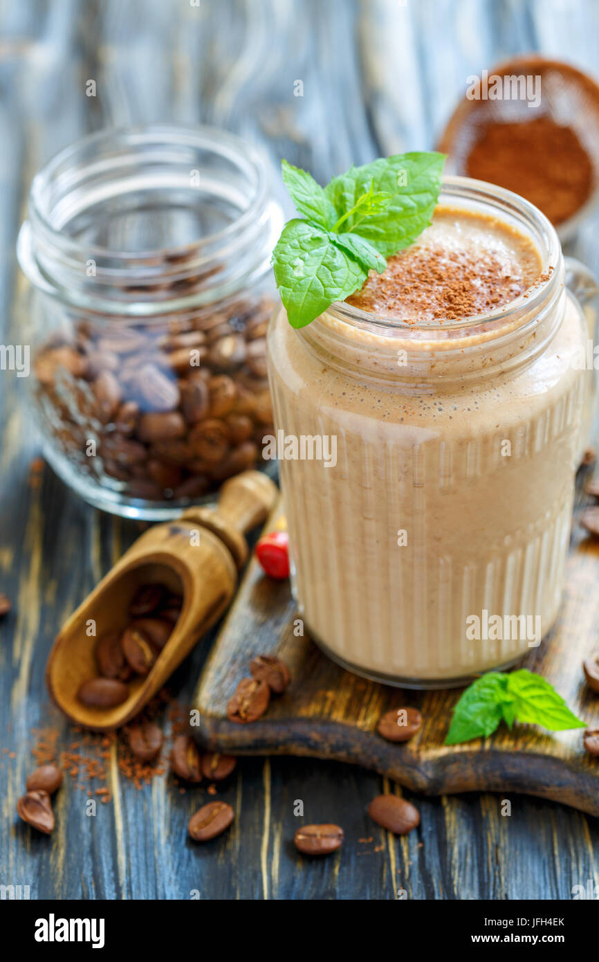 Invigorating coffee smoothie in a glass jar. Stock Photo