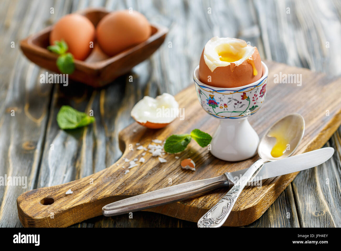 Boiled soft-boiled egg in the stand. Stock Photo