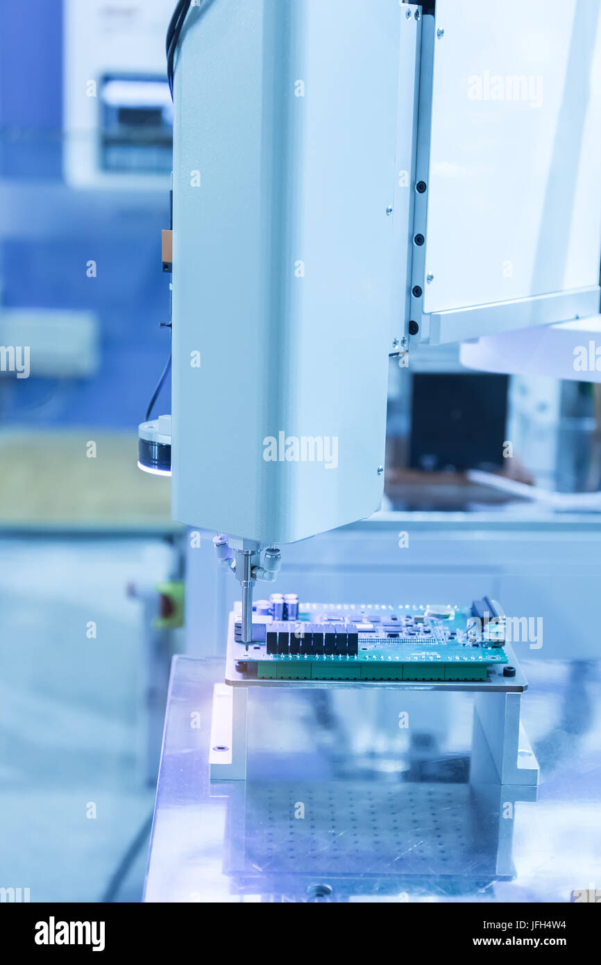 robot drill machine tool at pcb board industrial manufacture factory