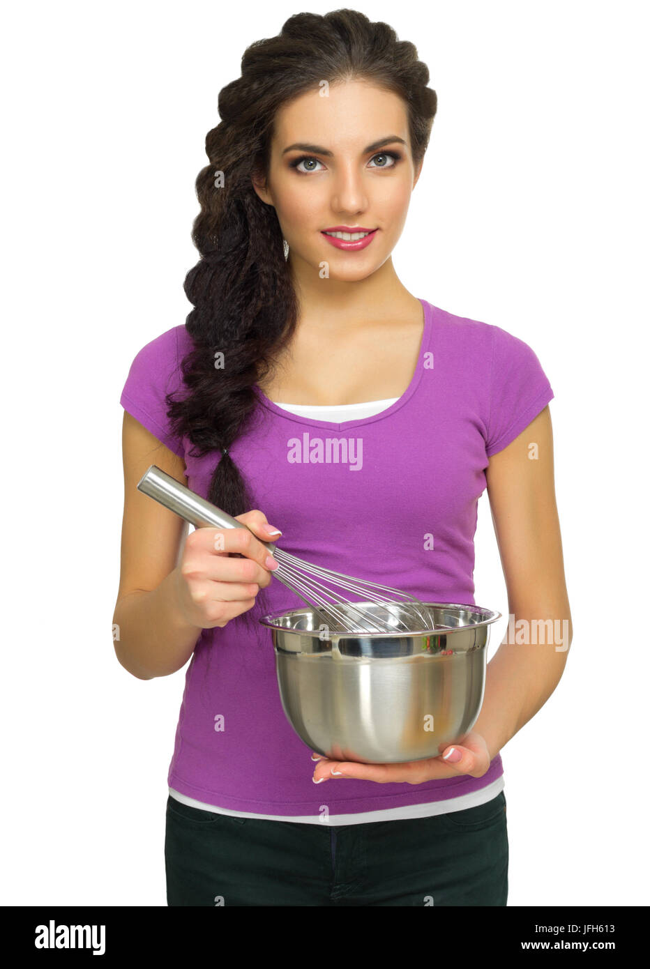 Young cooking woman isolated on white Stock Photo