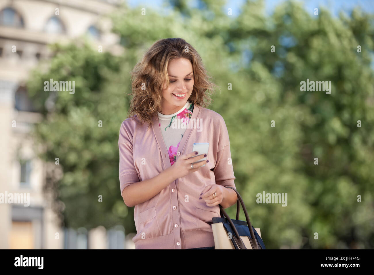 Checking email. Happy business lady. Stock Photo