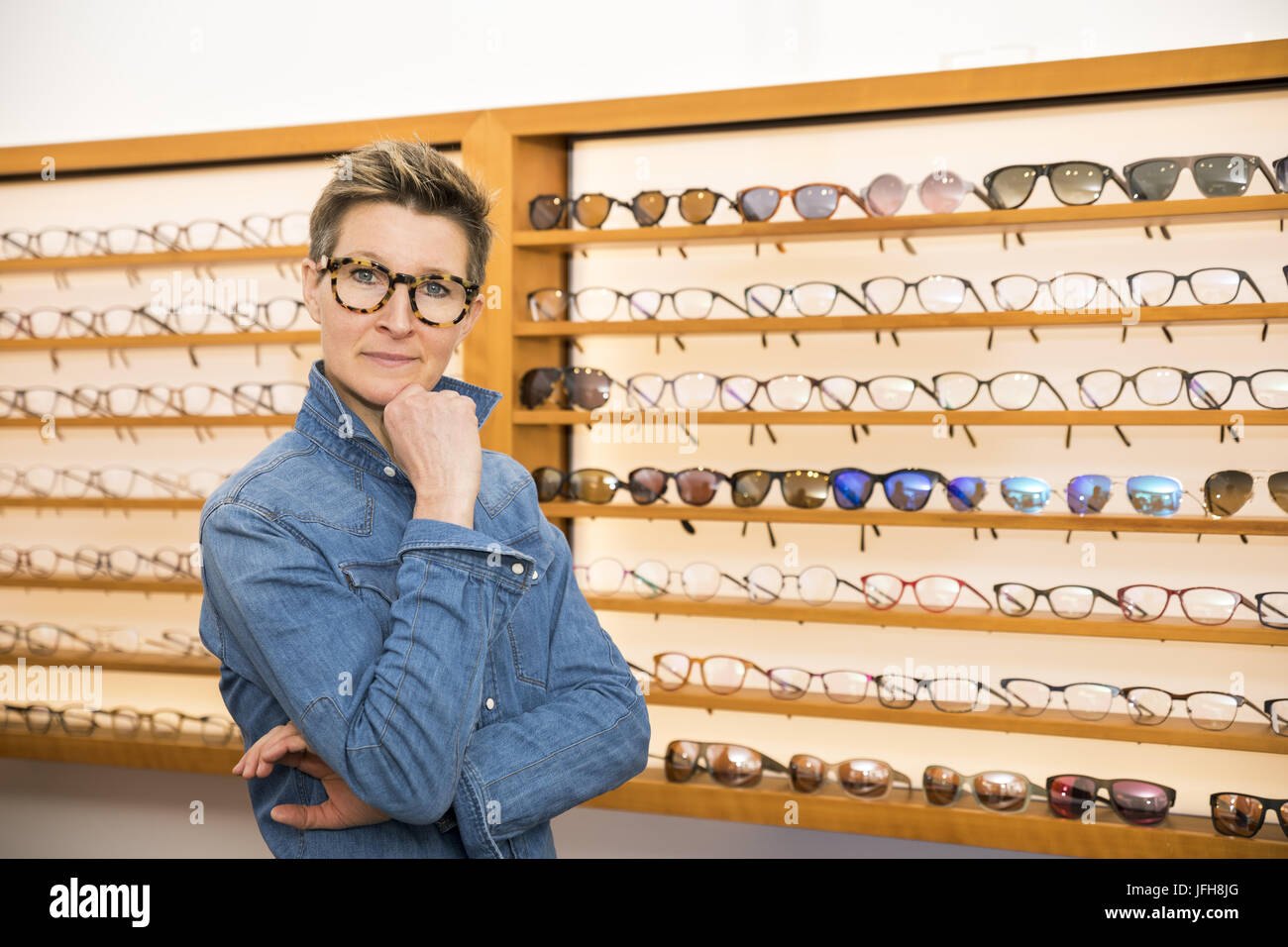 woman in a eyewear store Stock Photo