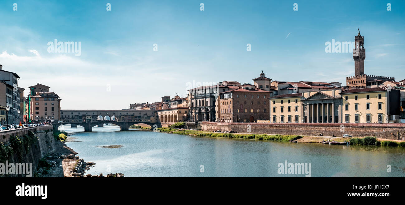 Ponte Vecchio and other historical buildings on the Arno river banks Stock Photo