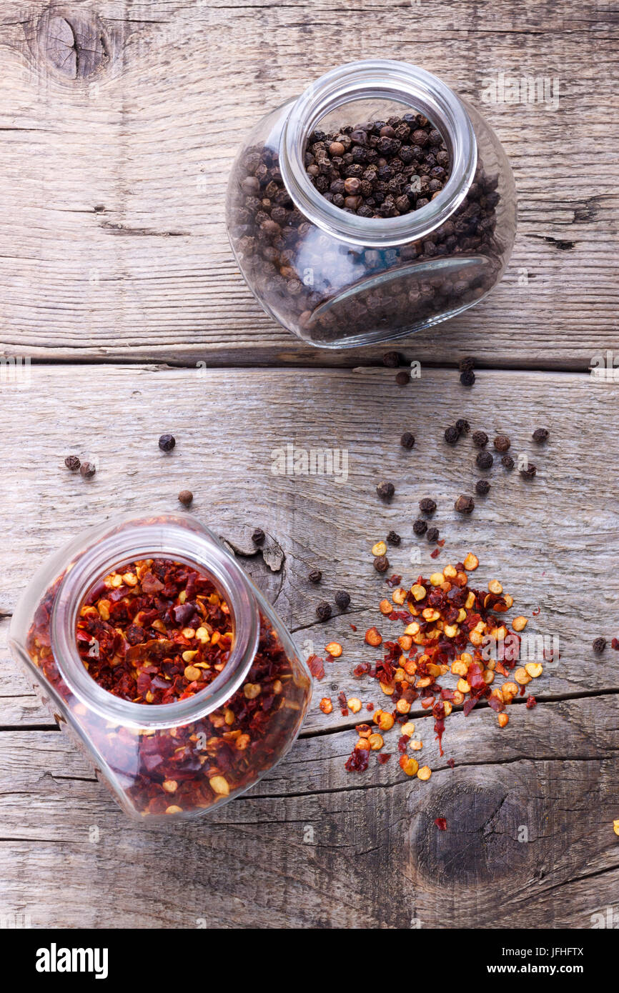 Chili flakes and black pepper Stock Photo Alamy