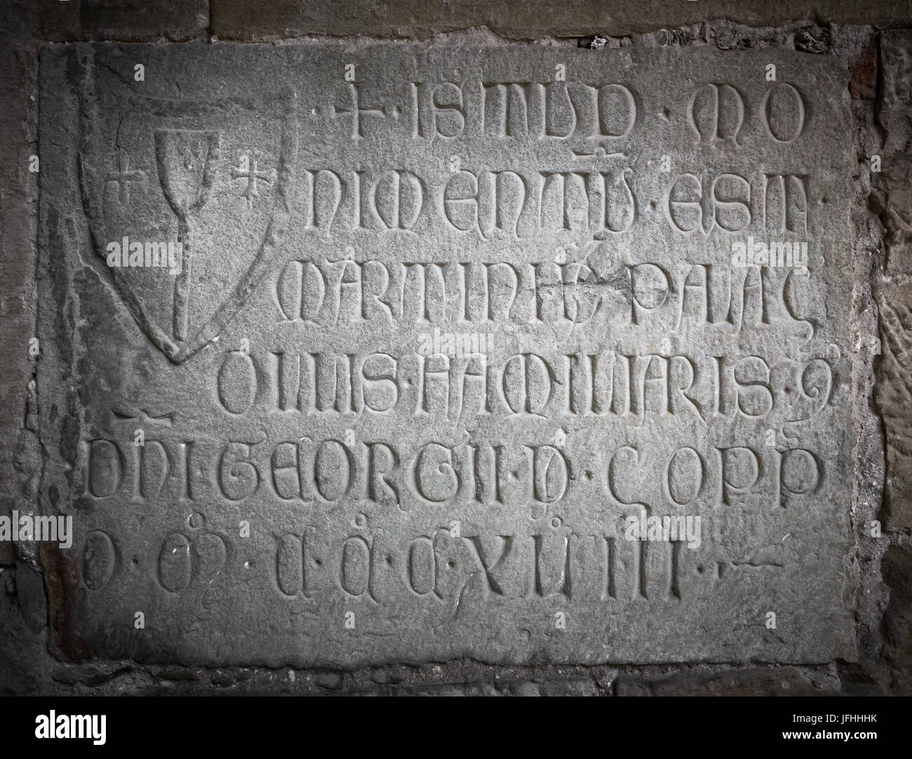 engraved-stone-with-latin-letters-JFHHHK.jpg