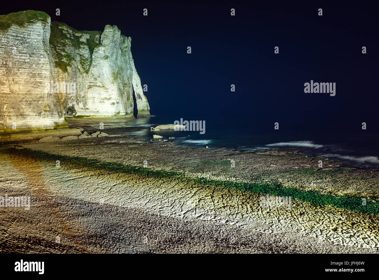 Natural cliff in Etretat, France. Night scene Stock Photo - Alamy