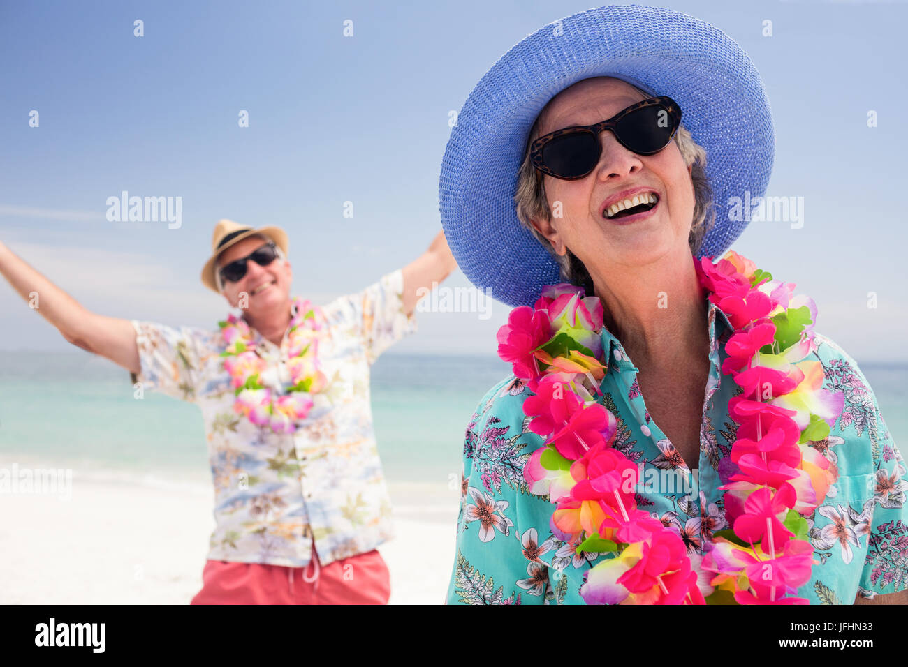 Happy senior couple having fun together on the beach Stock Photo Alamy