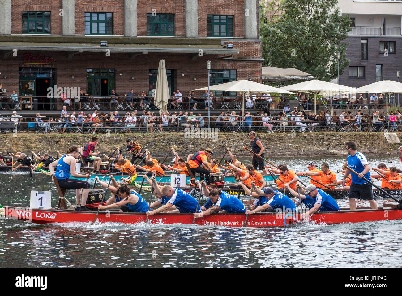 Dragonboat regatta in the inner harbor of Duisburg, Germany, racing in ...