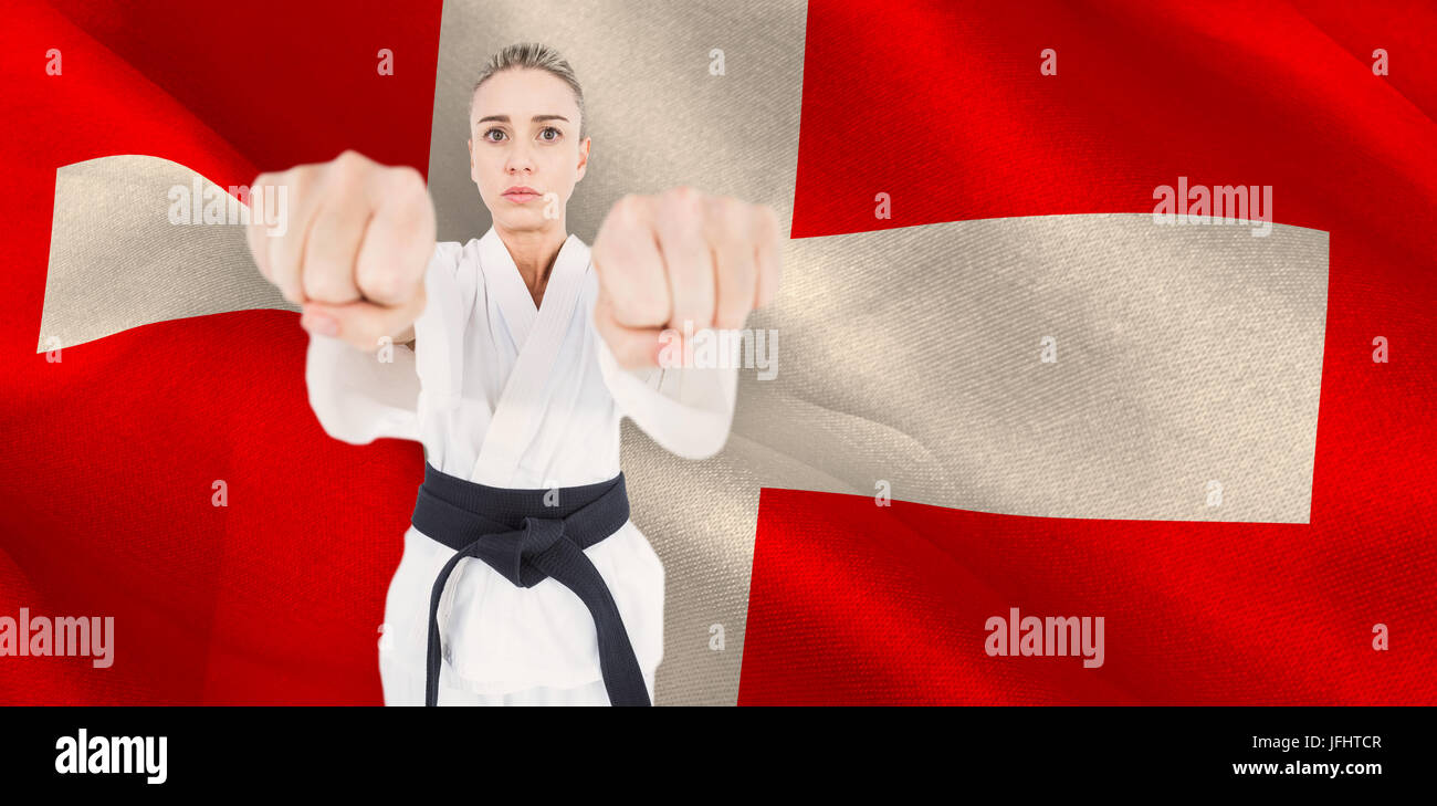 Composite image of female athlete practicing judo Stock Photo