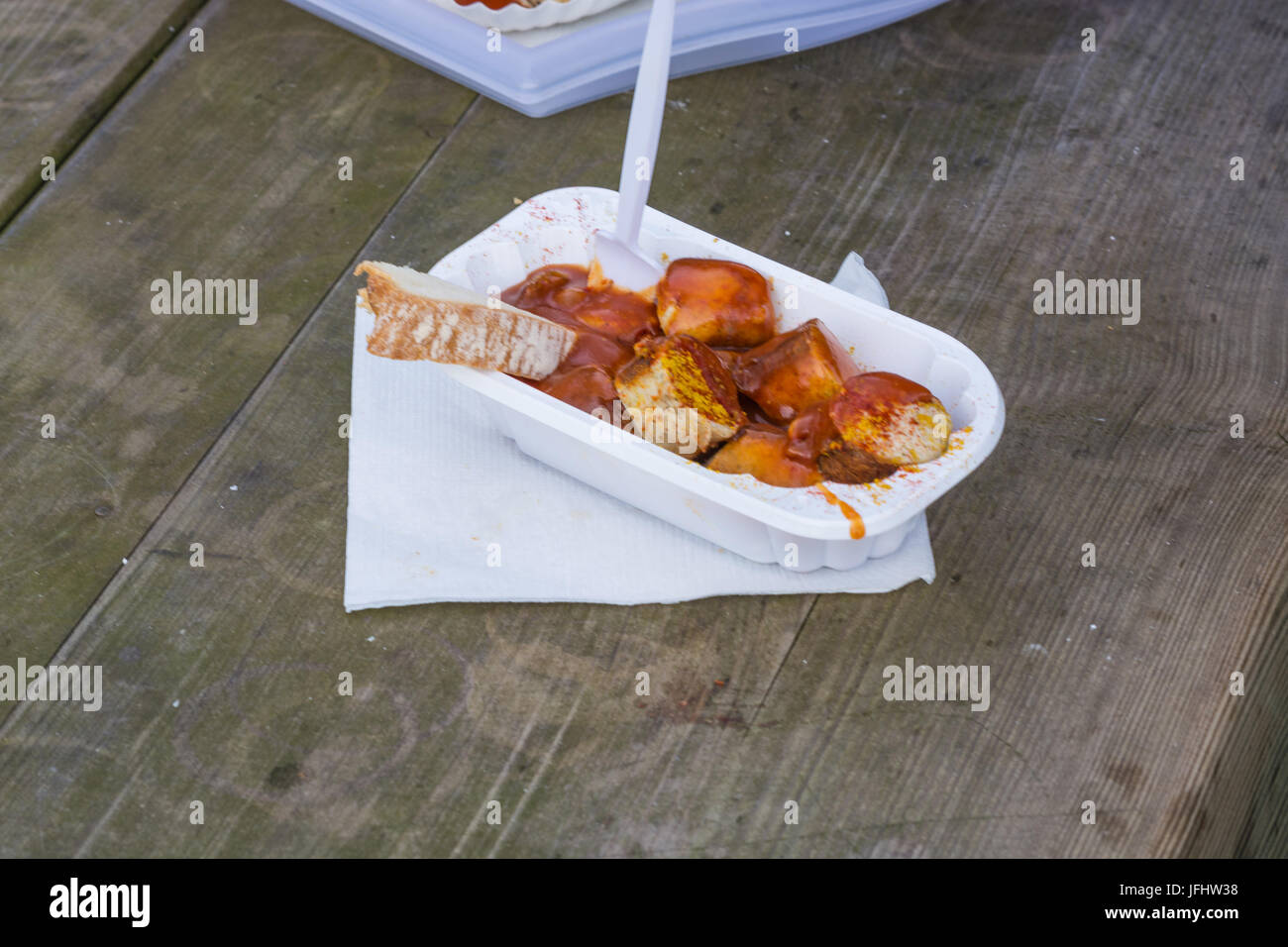 German currywurst - pieces of curried sausage Stock Photo