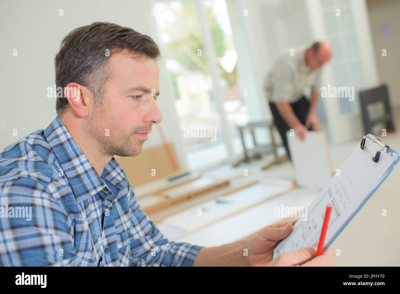 setting up furniture Stock Photo Alamy