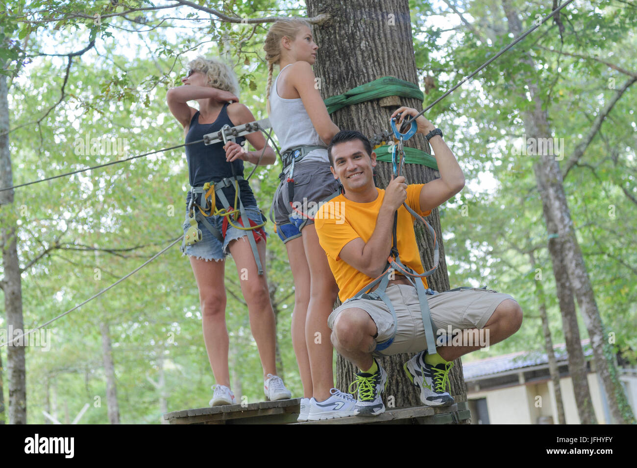 crossing the zipline Stock Photo Alamy