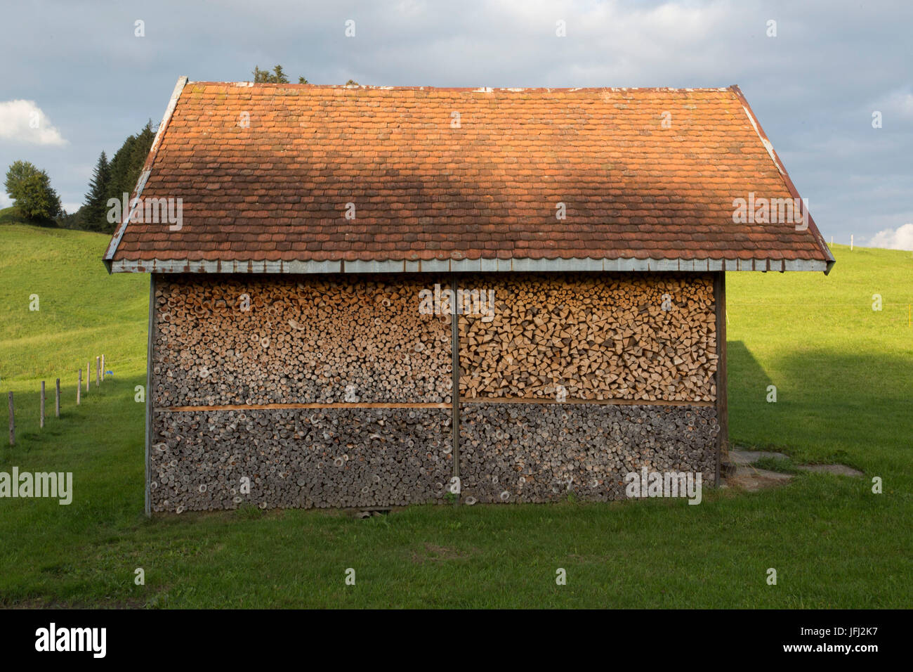 hut with firewood Stock Photo