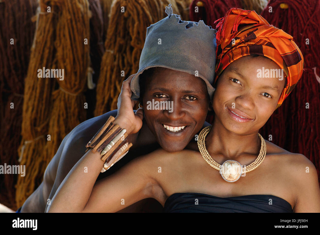 Africa, Namibia, Kiripotib farm of Claudia von Hase, Kirakara art, young couple, Damara girl with jewellery from the goldsmiths atelier of Claudia Stock Photo