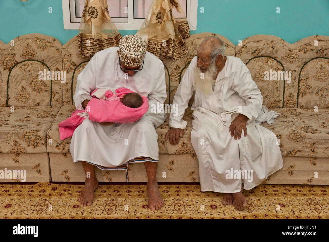 Arabia, Arabian peninsula, Sultanate of Oman, Saiq plateau, Jebel Akhdar, Sayq, the oldest Omani, 114 years, Sulaiman Bin Hilal Bin Amor At DegorJ, men, generations, baby Stock Photo