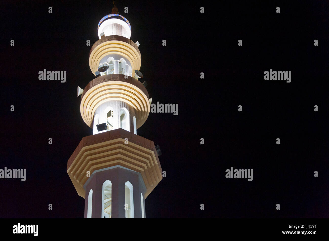 Arabia, Arabian peninsula, Sultanate of Oman, Muscat, mosque, minaret, illuminated, at night Stock Photo