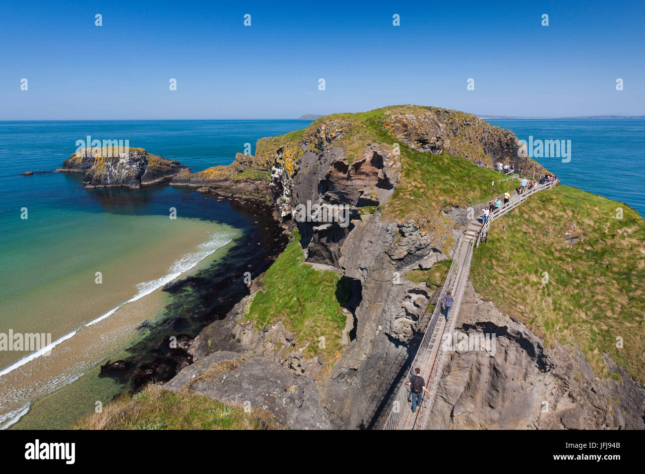 UK, Northern Ireland, County Antrim, Ballintoy, pathway to the Carrick-a-Rede Rope Bridge Stock Photo