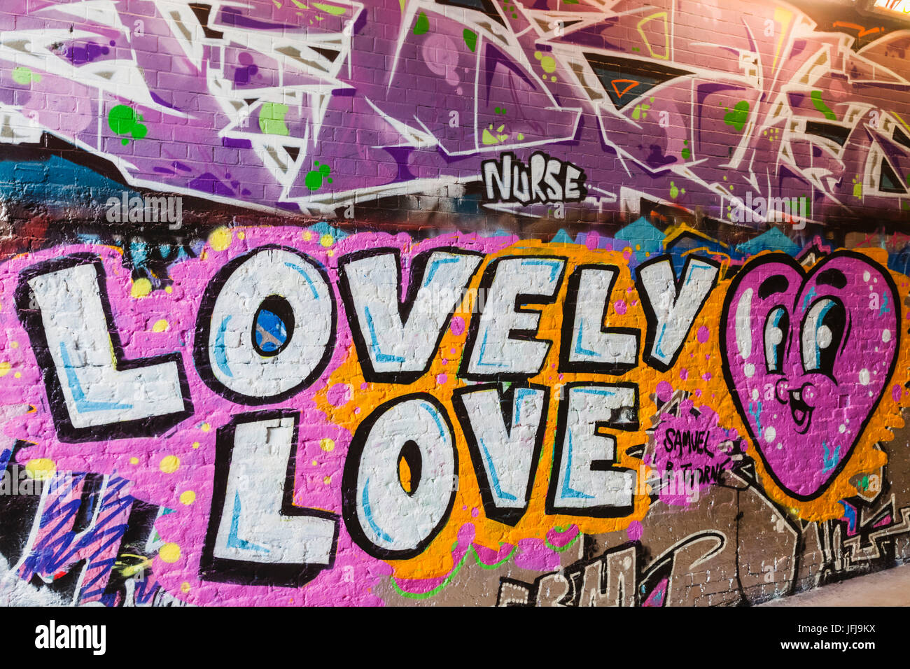 England, London, Lambeth, Waterloo, Leake Street, Graffiti and Wall Art Tunnel, Street Art with Words Lovely Love and Heart Stock Photo