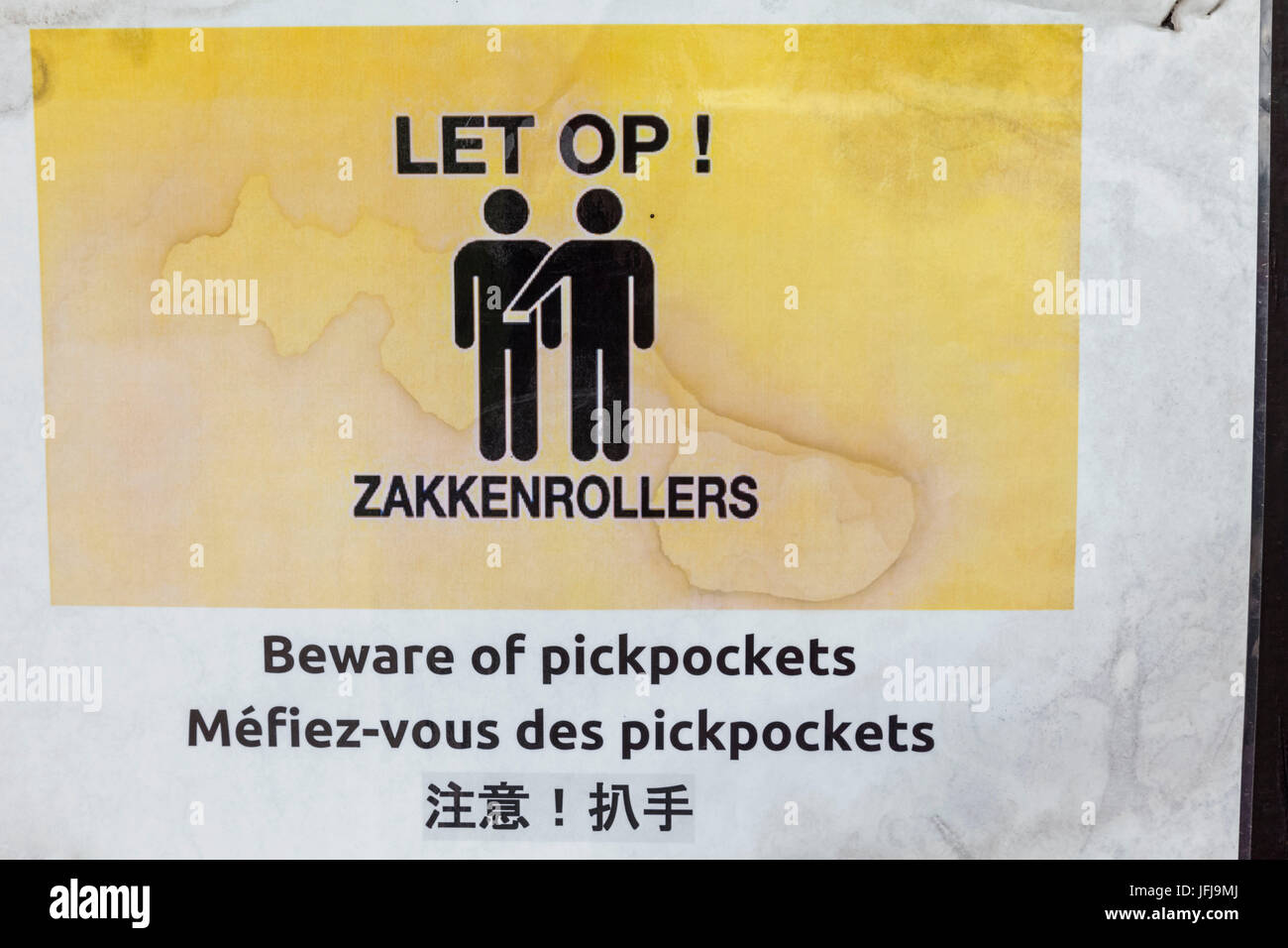 Europe, Netherlands, Amsterdam, Multi-lingual Pickpocket Warning Sign Stock Photo