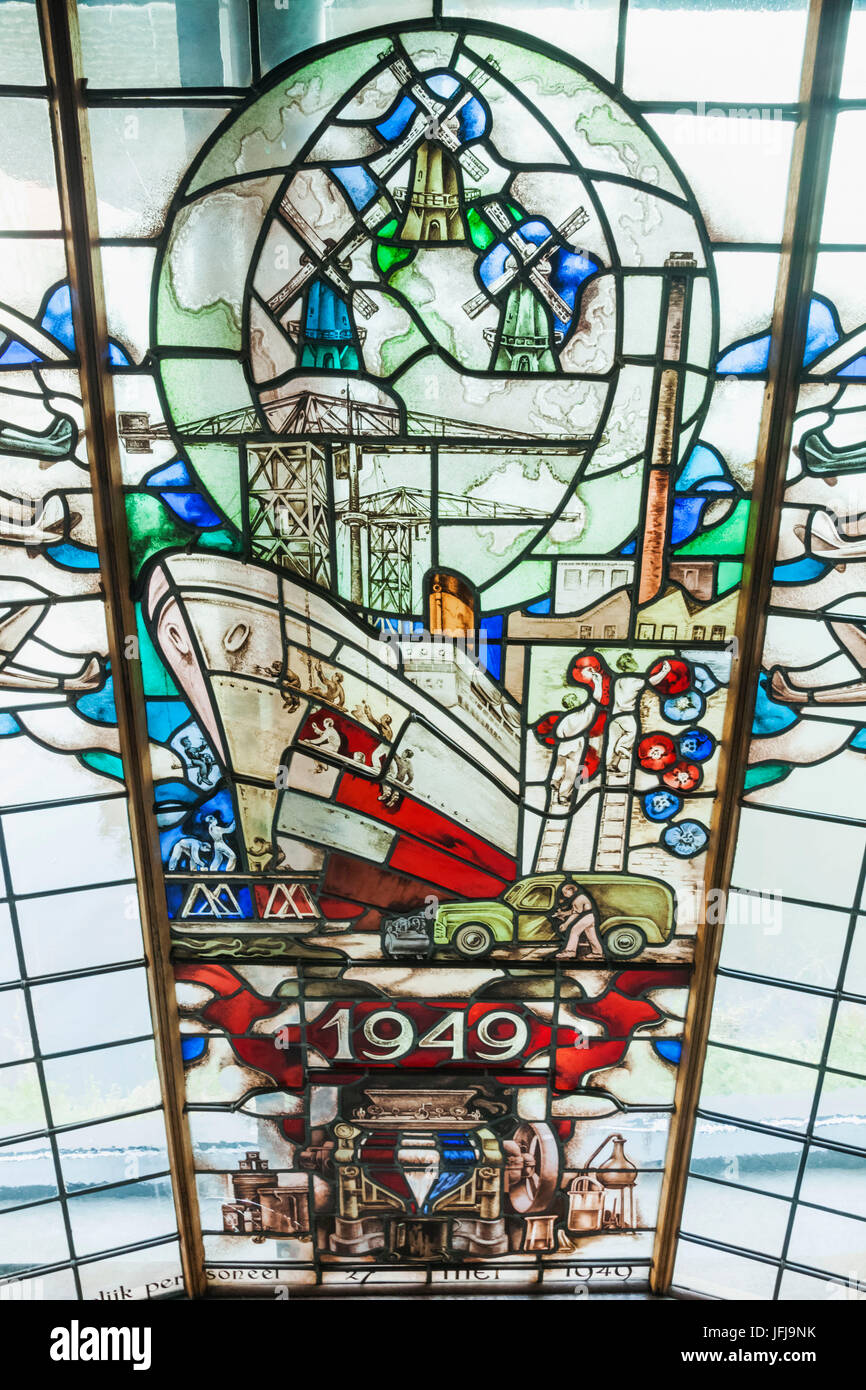 Europe, Netherlands, Zaandam, Zaanse Schans, Zaanse Museum, Stained Glass Window depicting Economic Scenes from 1949 Stock Photo