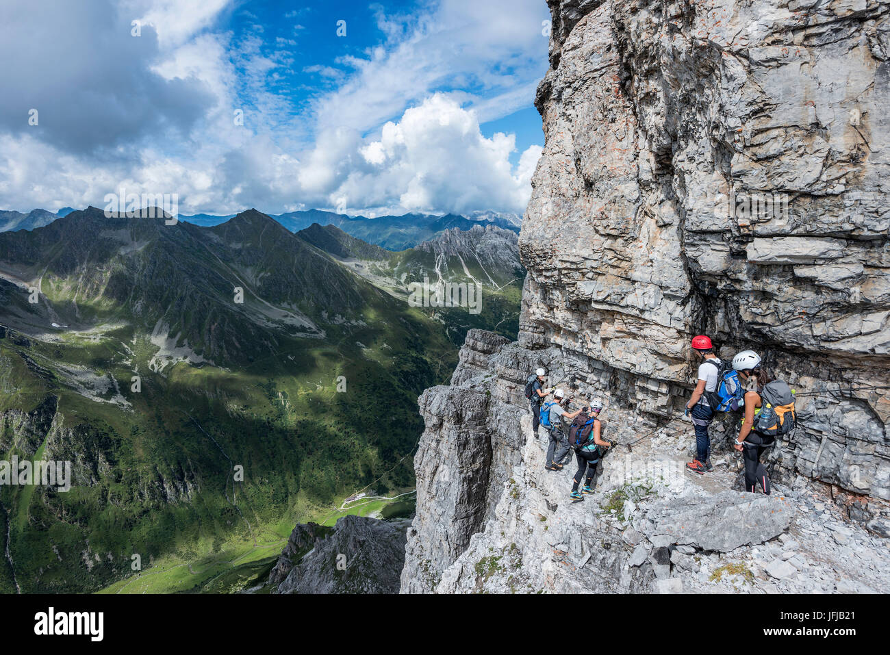 Stubai Alps, Tyrol, Austria, Climbers on the via ferrata of the Ilmspitze, Stock Photo