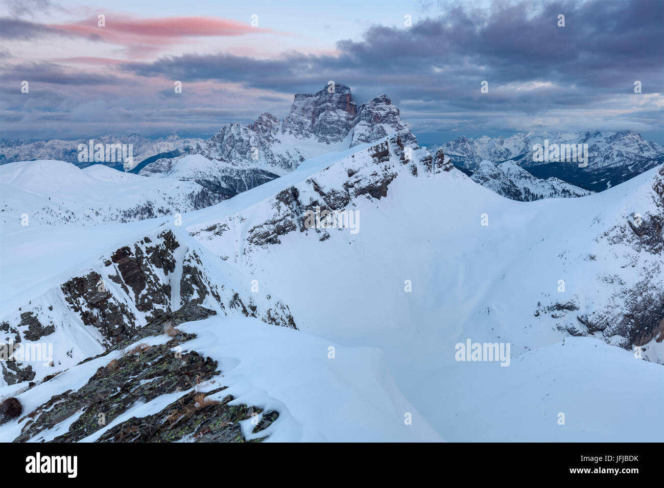 Europe, Italy, Veneto, Belluno, Winter view towards mount Mondeval, followed by the imposing mount Pelmo, Dolomites Stock Photo
