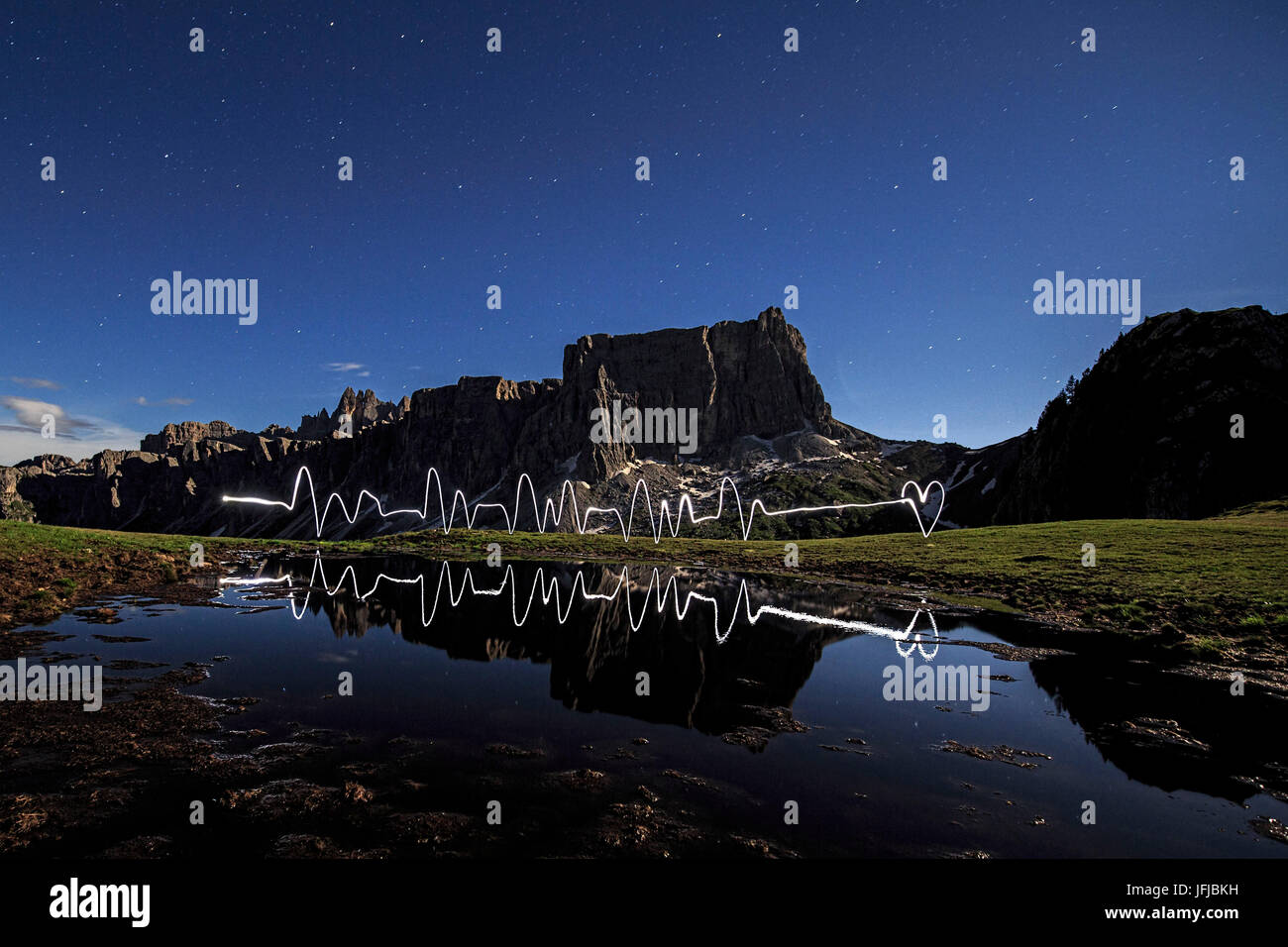 Light painting in front of Lastroni of Formin at Giau Pass during a full moon night, Cortina d'Ampezzo, Dolomites, Veneto, Italy, Europe Stock Photo