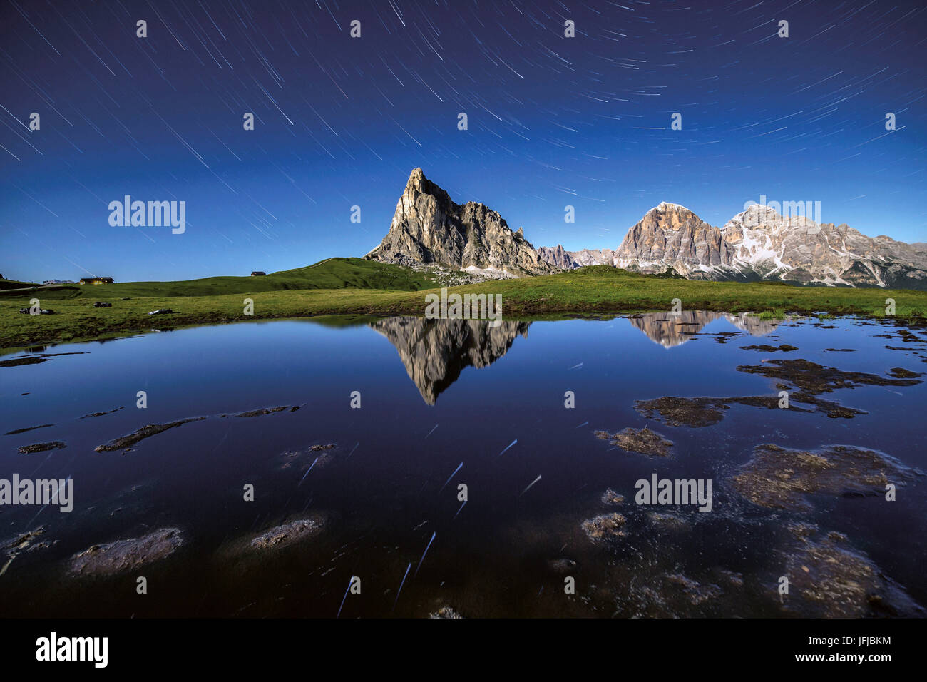 Startrail at Giau Pass during a full moon summer night, Cortina d'Ampezzo, Dolomites, Veneto, Italy, Europe Stock Photo