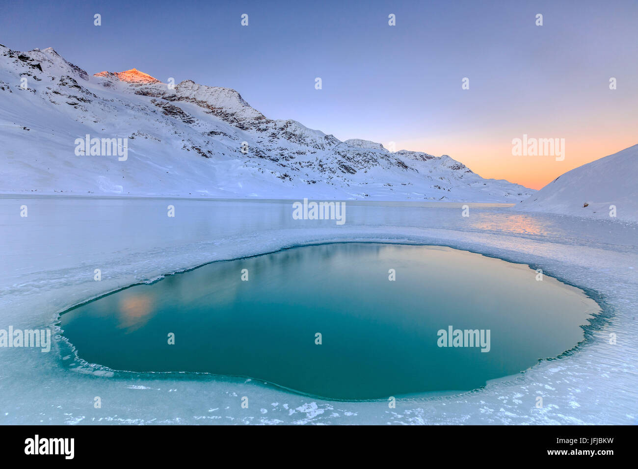 Puddle in the middle of Lake Bianco the only point where the water rises to the surface, Bernina Pass, Canton of Graubunden, Engadine, Switzerland, Europe Stock Photo