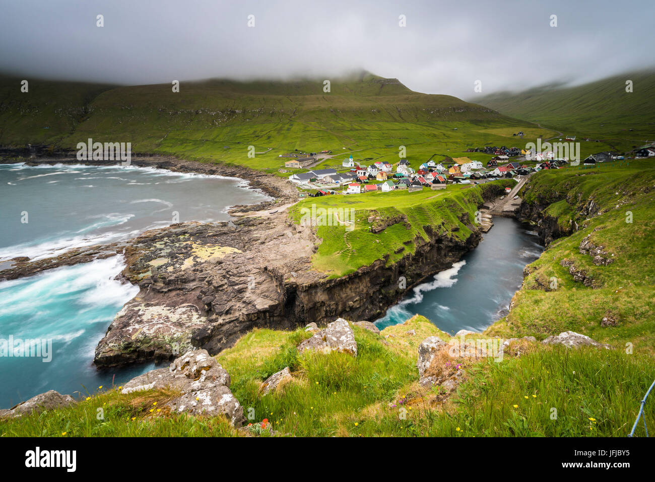 Gjogv, Eysturoy island, Faroe Islands, Denmark, Village and its natural harbor, Stock Photo