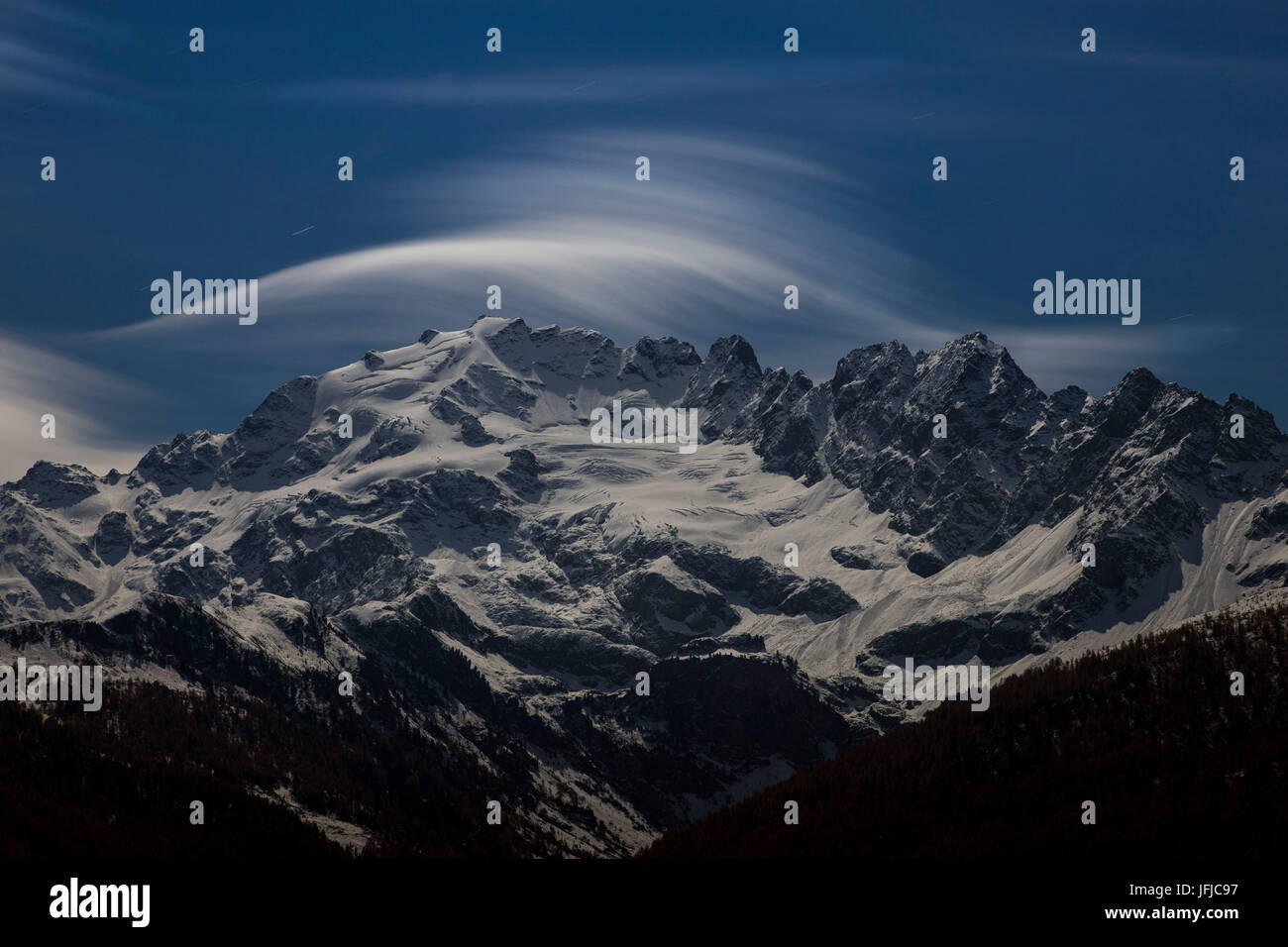 Europe, Italy, Lombardy, Valtellina, Cima Piazzi nightscape during a full moon night Stock Photo