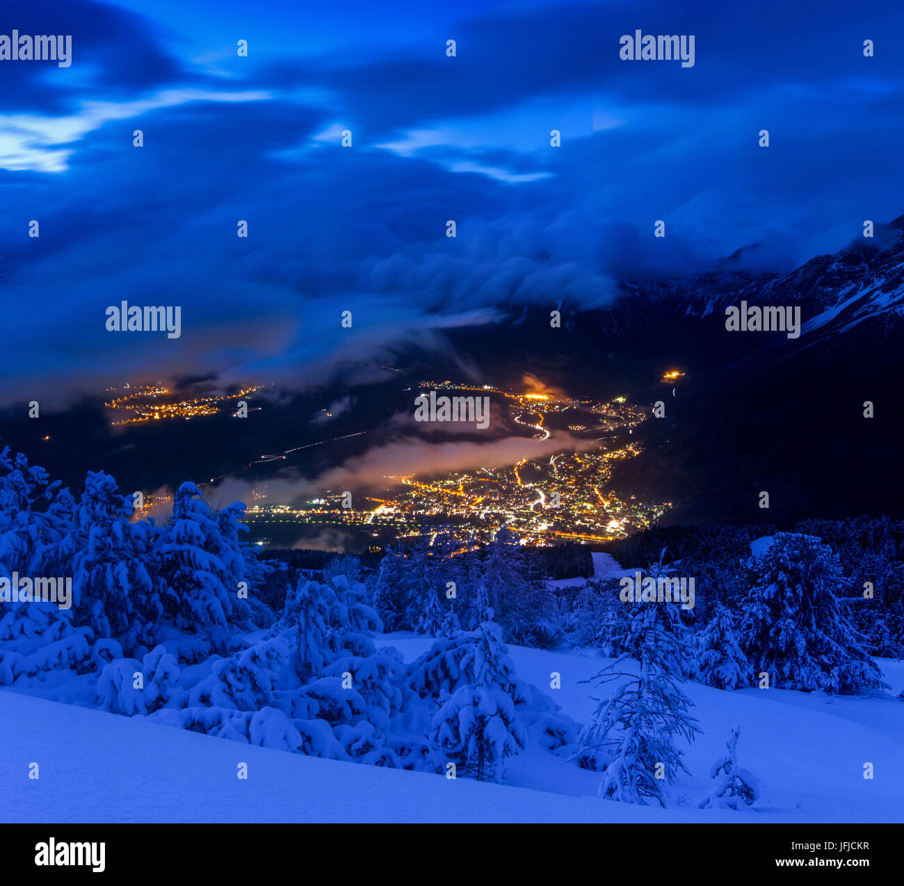 Europe, Italy, Lombardy, Sondrio, Bormio at blue hour after a snowfall in winter, Turistic places of italian Alps Stock Photo