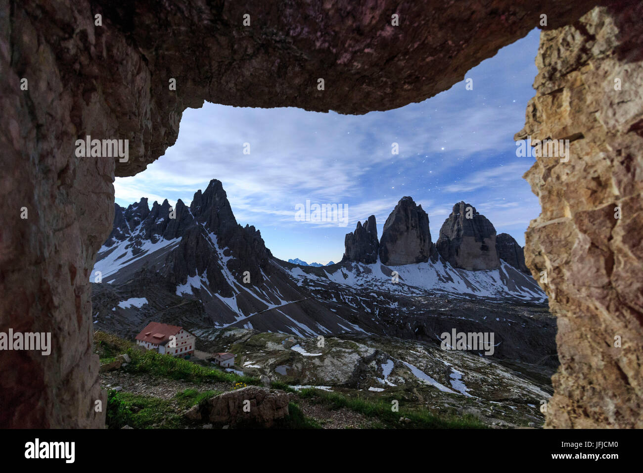 The Three Peaks of Lavaredo seen from a cave at night, Sesto Dolomites Trentino Alto Adige Italy Europe Stock Photo