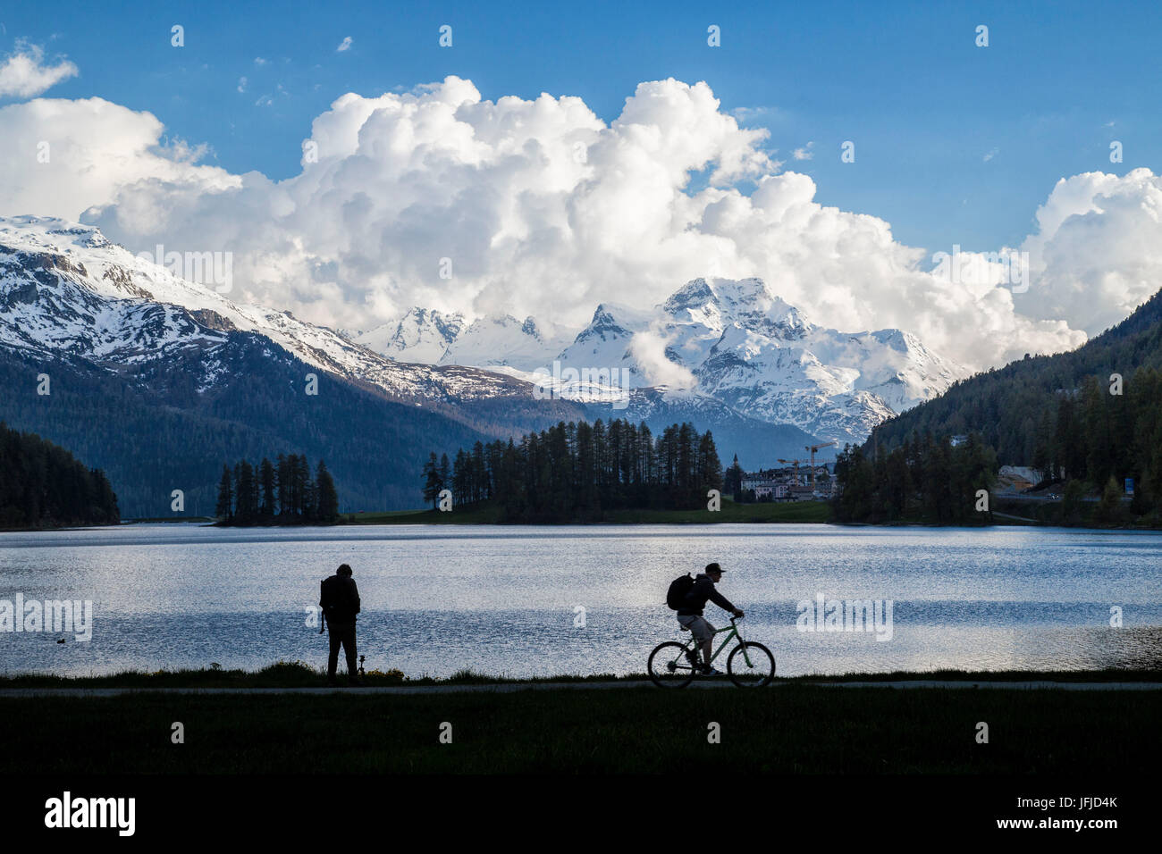 Silhouette of people on the shore of Lake Silvaplana Canton of Graubünden Maloja Engadine Switzerland Europe Stock Photo