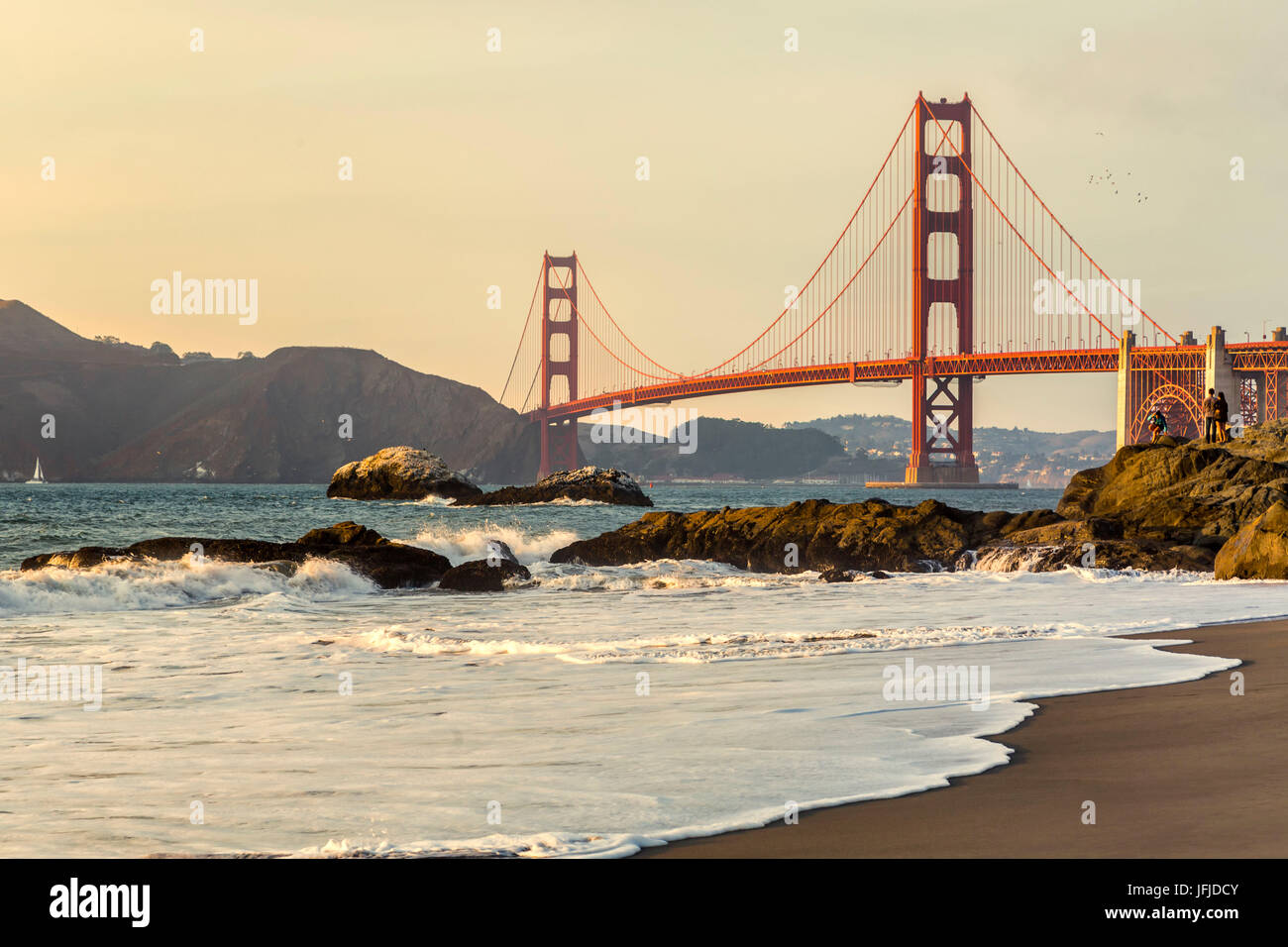 Golden Gate Bridge at sunset shot from Baker Beach, San Francisco, Marin County, California, USA, Stock Photo