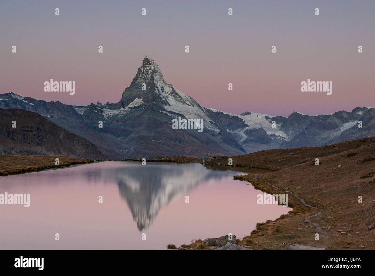 The Matterhorn's reflection in the Lake Stallisee at sunrise, Zermatt valley, Valais-Wallis Canton, Switzerland Stock Photo