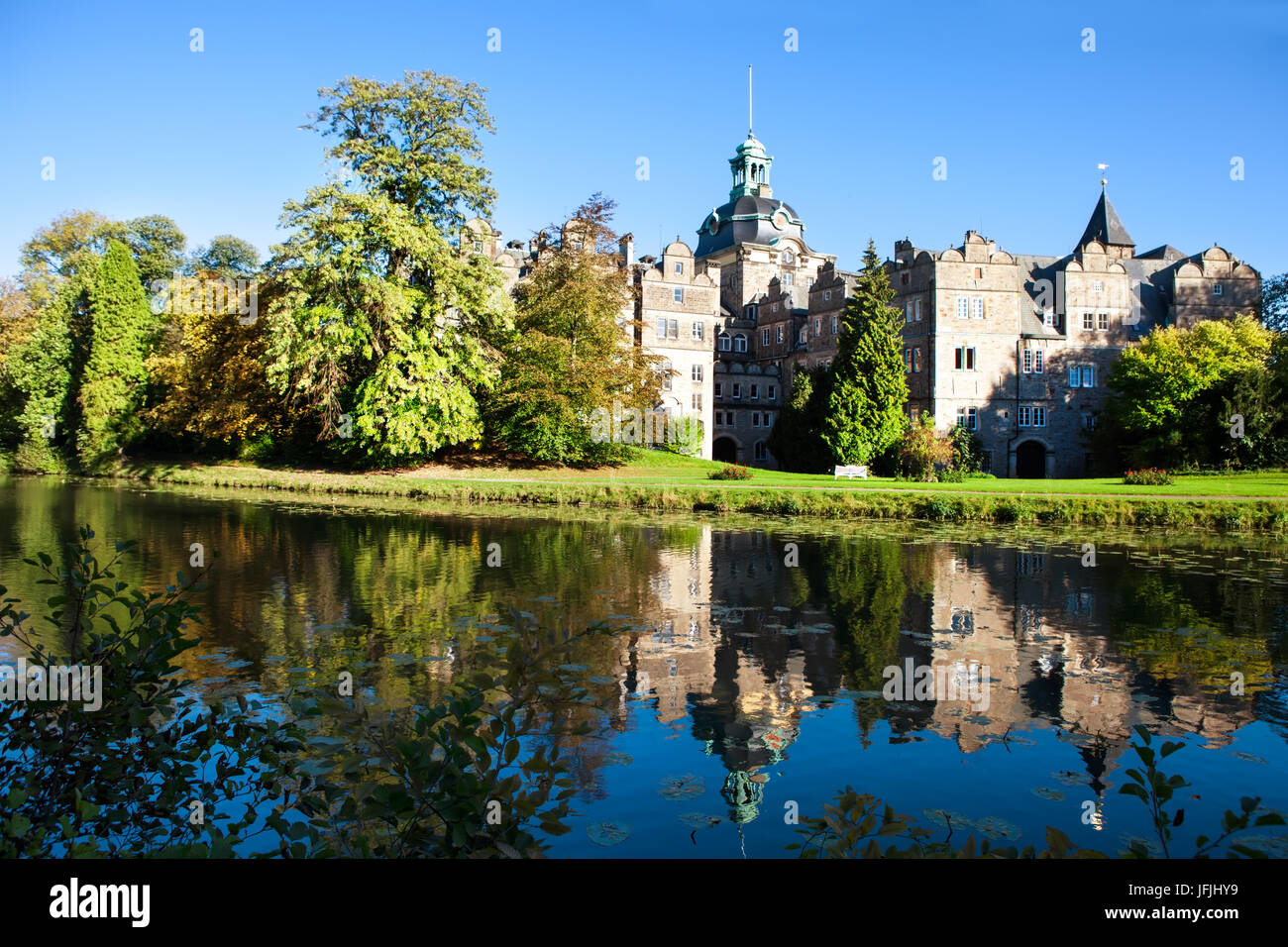 Castle Bueckeburg reflecting in the moat Stock Photo