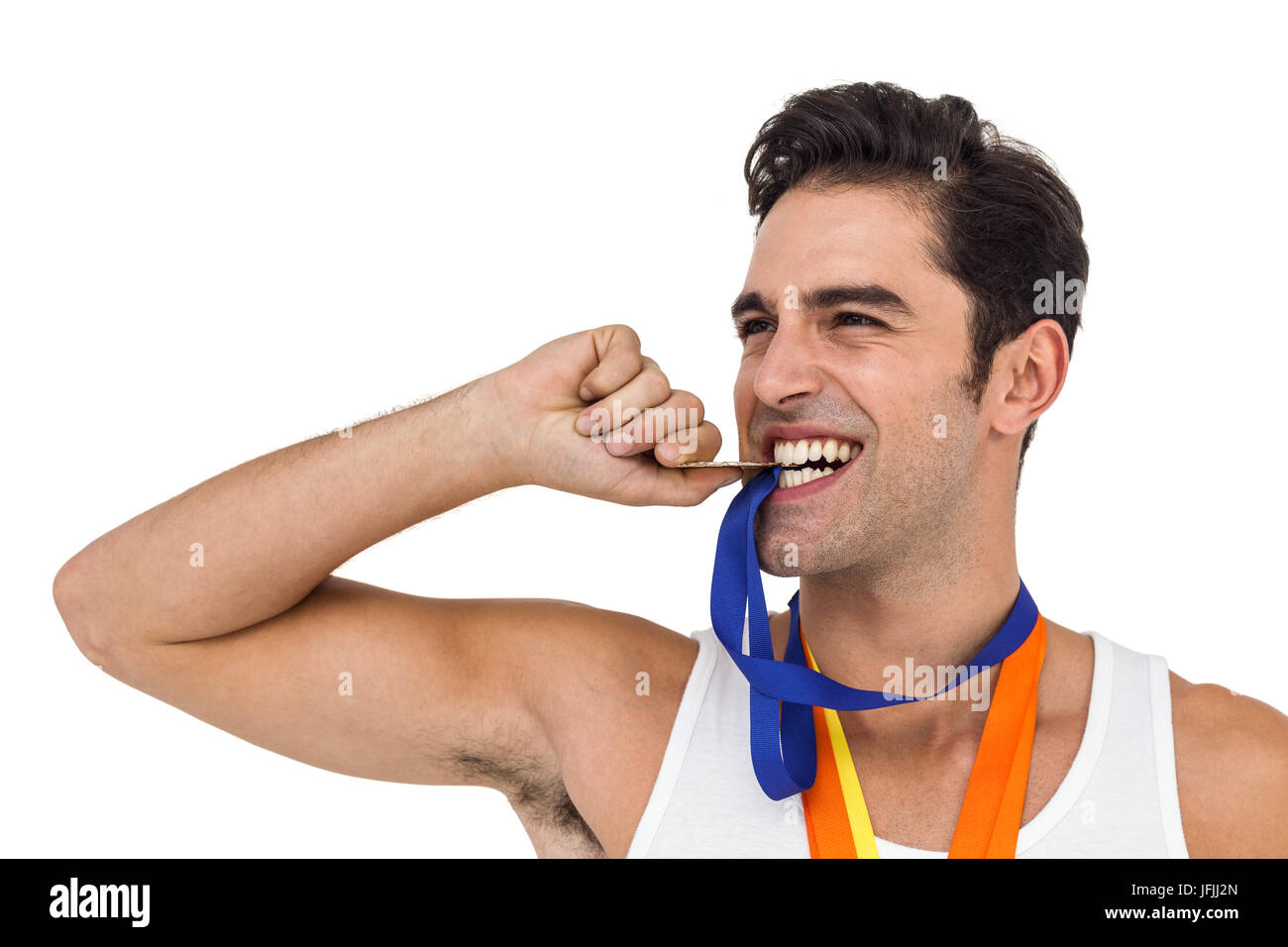 Athlete posing with gold medals around his neck Stock Photo