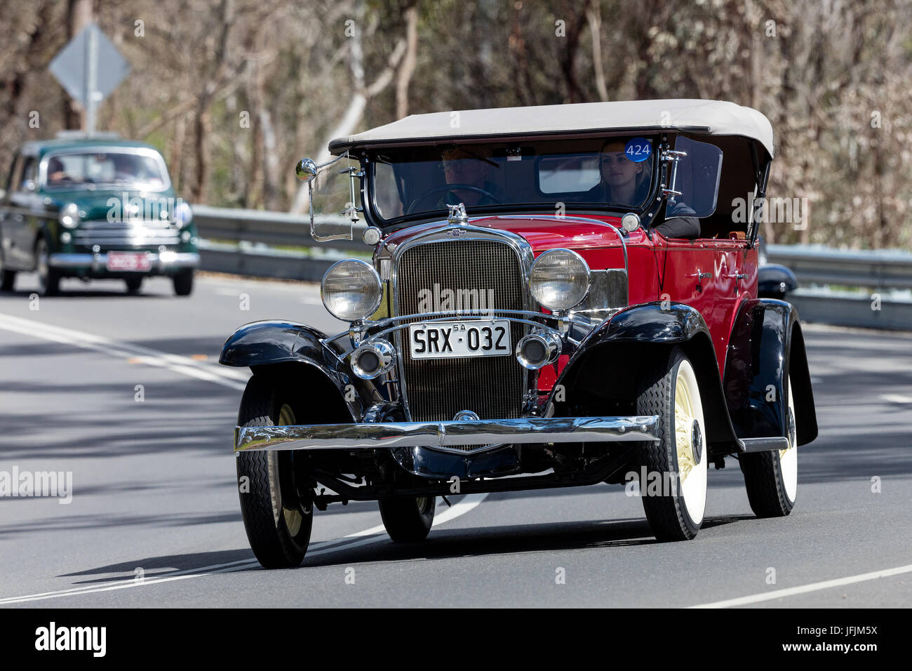 Vintage 1932 Chevrolet Confederate Sports Roadster  driving on country roads near the town of Birdwood, South Australia. Stock Photo